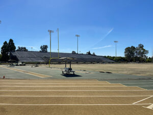 CSUS's Hornet Stadium, old field being demolishing to replace it with shiny new turf for the 2021 football season. View of field goal from the track/sidelines.